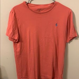 Salmon pink polo shirt
